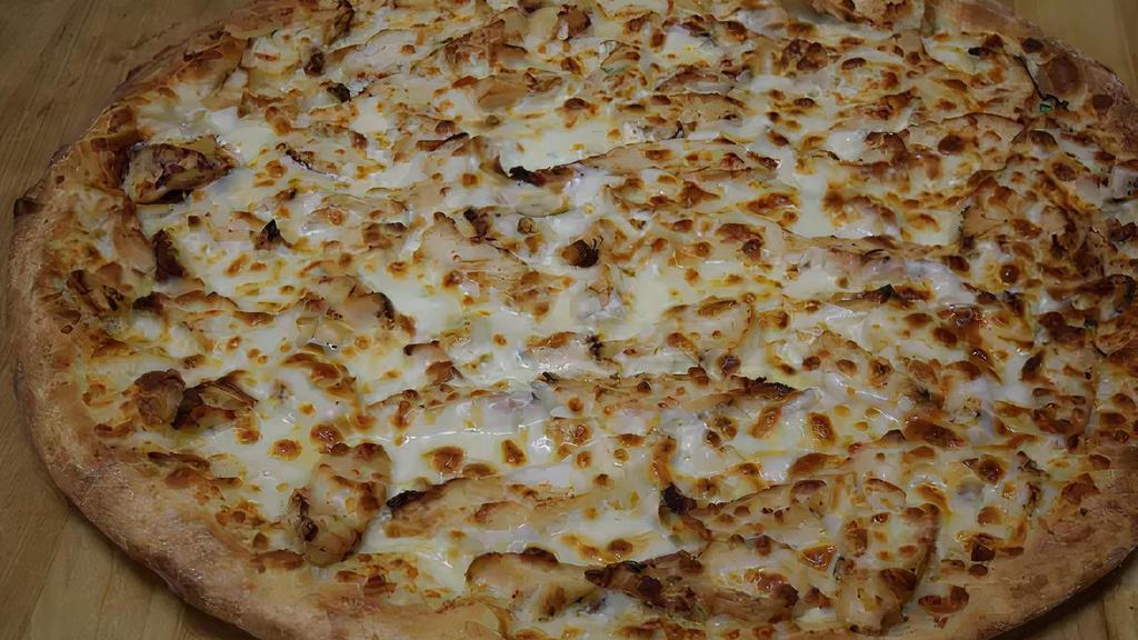 Chicken Alfredo Pizza · A blend of butter, Parmesan, cream and tender chicken covered with mozzarella.