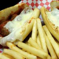 Meatball Parmigiana Sub · Meatballs topped with provolone cheese covered in our marinara sauce.