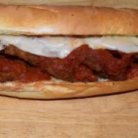Chicken Parmigiana Sub · Breaded chicken breast topped with provolone cheese covered in our marinara sauce.