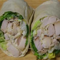 Chicken Caesar Wrap · Grilled chicken, lettuce, imported Parmesan cheese and Caesar dressing.