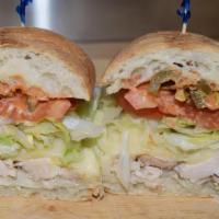 Chicken Chipotle Panini · Grilled chicken, lettuce, tomatoes, chipotle sauce and provolone cheese on a ciabatta roll.