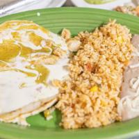 El Mezcal Special  · Grilled chicken breast with melted cheese and green sauce on top, Served with rice, Beans an...