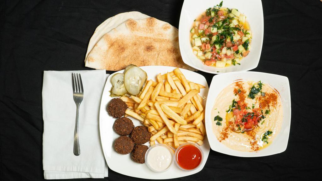 Falafel Platter · Includes falafel, Fries , sides of (hummus tahini sauce and salad) And wrap.