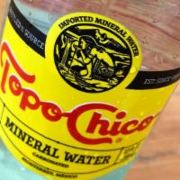 Topo Chico Sparkling Mineral Water · 12 oz glass bottle  *bottle opener required