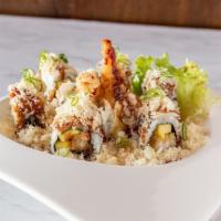 Princess Roll · Shrimp tempura & Mango inside, topped w. torched white tuna plashed w. our chef’s special sa...