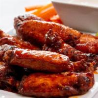 Firecracker Wings · fried chicken wings with bleu cheese dressing, celery, carrot sticks.  8 wings per order