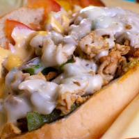 Chicken Philly · All white meat chicken, lettuce, tomato, grilled onions, American, provolone, mayo.