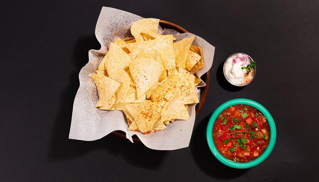 Chips And Salsa · Tortilla chips with housemade fresh salsa.