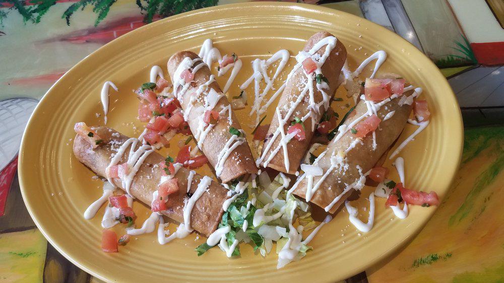 Burrito · All burritos are wrapped in a soft flour tortilla with Mexican rice, beans, and your choice of meat, smothered with your choice of sauce and cheese. Topped with lettuce, tomato, and sour cream or dry.