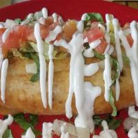 Chimichangas · A flour tortilla stuffed with Mexican rice, beans, cheese, and your choice of meat deep frie...