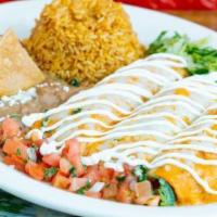 Enchiladas · Corn tortillas stuffed with your choice of meat smothered with your choice of sauce and melt...