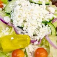 Greek Salad · Lettuce, tomatoes, cucumbers, red onions, feta cheese, kalamata olives, dolmades  and pepper...