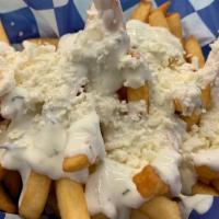 Loaded Greek French Fries · Golden crispy french fries with tzatziki and feta cheese