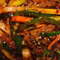 Jaeyuk Bokkeum · Stir-fried pork with onion, and pepper served in spicy sauce.