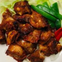 Dwae Ji Gal Bi Bbq · Spicy pork ribs.