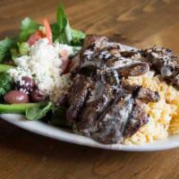Lamb Kabob Plate  · Marinated lamb tenderloin cooked to order. Served with rice and a Mediterranean salad.