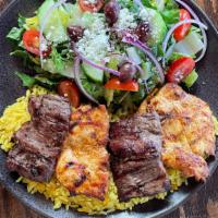 Lamb & Chicken Plate  · Combination of lamb and chicken kabob. Served with rice and Mediterranean salad.