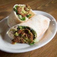 Shawafel  · Chicken shawarma and falafel mixed on a roll up served on a toasted pita roll up, hummus, pi...