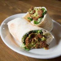 Falafel Roll Up  · Deep fried patties of seasoned ground garbanzo beans, mixed with garlic and spices. Served i...