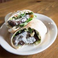 Kafta Roll Up  · Char-broiled ground beef mixed with finely chopped parsley, onions, and spices with hummus. ...