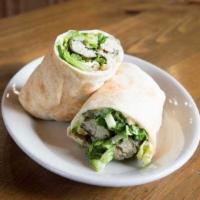 Grape Leave Roll Up  · A vegetarian delight. Served in fresh pita bread with hummus, pickoles ,herbs and tahini sauce