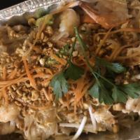 Pad Thai · The classic Thai dish everyone knows and loves. A noodle dish stir-fried with both chicken a...