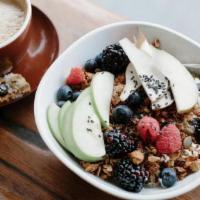 Muesli · Whipped Greek yogurt topped with housemade granola, raspberries, blueberries, blackberries, ...