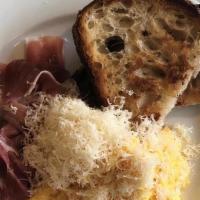 Prosciutto & Parmesan Scrambled Egg Plate · Two eggs soft scrambled served with prosciutto, Parmesan and toasted housemade sourdough. . ...