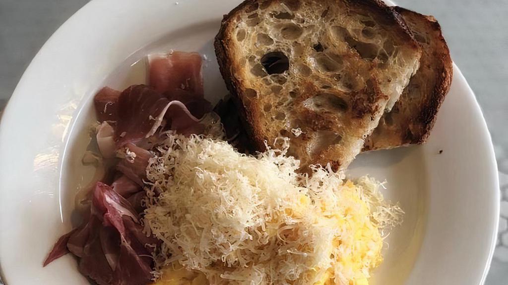 Prosciutto & Parmesan Scrambled Egg Plate · Two eggs soft scrambled served with prosciutto, Parmesan and toasted housemade sourdough. . Contains: Wheat, Dairy, Egg