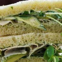 Turkey Avocado Sandwich · Turkey, avocado, alfalfa sprouts, cucumbers, and green herb dressing on housemade challah.. ...