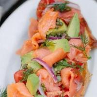 Smoked Salmon And Avocado Tartine · Smoked Salmon, avocado, Campari tomatoes, red onion, capers, and dill tossed with olive oil ...
