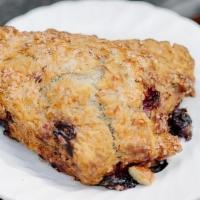 Sour Cherries Almond Scone · Tender and buttery scone with sour cherries and toasted almonds.. Contains: Wheat, Dairy, Tr...