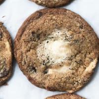 Halva Chocolate Chunk Cookie · Fresh baked daily these cookies are crisp on the edge and chewy in the middle. Loaded with d...