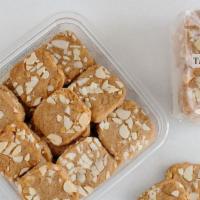 Almond Square Bag · Twelve of our Almond Square Cookies - Brown sugar butter cookies baked with sliced almonds. ...