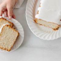 Lemon Drizzle Cake Slice · Tart, buttery lemon pound cake. Contains: Wheat, Eggs, Dairy
