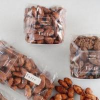 Spiced Almonds · Sweet, salty and savory roasted almonds.. Contains: Egg, Tree Nut (Almond)