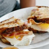 Gf Breakfast Sandwich · Eggs your style, Vermont cheddar, and bacon on gluten-free bread. . Contains: Dairy, Egg
