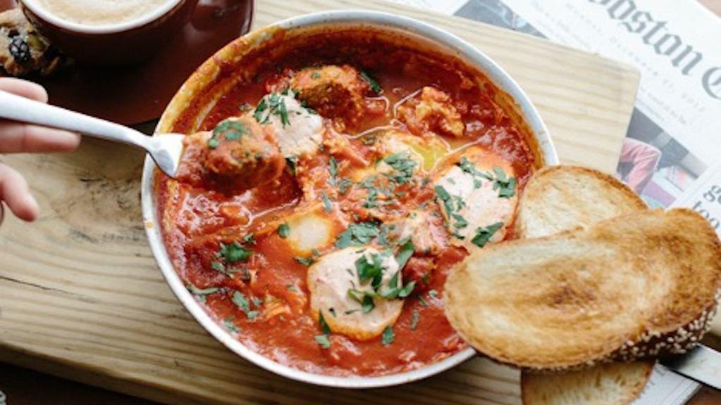 Gf Traditional Shakshuka · Traditional North African dish with tomato sauce, bell pepper, eggs, and feta cheese served with gluten-free bread.. Contains: Dairy, Egg