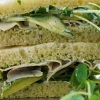 Gf Turkey Avocado Sandwich · Turkey, avocado, Ward's Berry pea shoots, cucumbers and green herb dressing on gluten-free b...