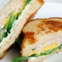 Gf Tuna Sandwich · Olive oil packed tuna salad, hardboiled egg, shaved red onion, yogurt & dill. . Contains: Da...
