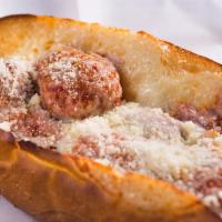 Meatball Parmesan · Juicy meatballs coated in our signature marinara sauce topped with melted provolone cheese a...