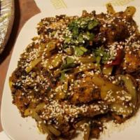 Chicken Sukka · A medley of curry leaves and cubes of chicken, chefs special spice rub, and garnished with c...