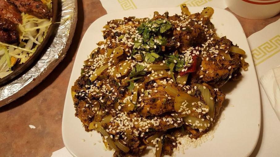 Chicken Sukka · A medley of curry leaves and cubes of chicken, chefs special spice rub, and garnished with coriander.