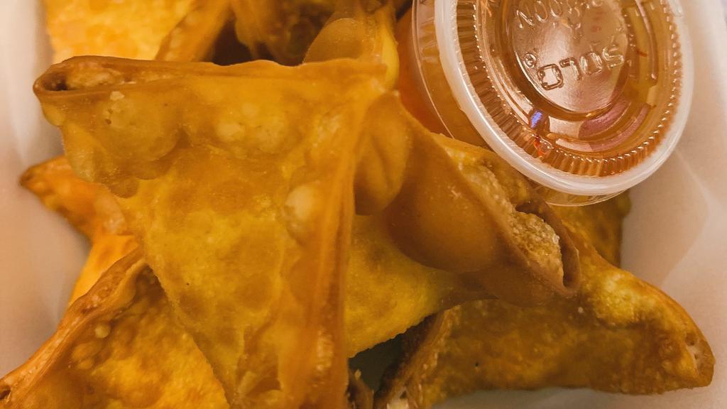 Crab Rangoons · Crabmeat with cream cheese fried in crispy wonton wraps, served with duck sauce.