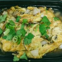 Egg Foo Young · Eggs, bean sporuts, onion. Choice of meat.Comes with gravy on top. Served with white rice.