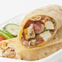 Paneer Tikka Roll · Indian cheese triangle marinated in yogurt, spices cooked, and wrapped in paratha. Served wi...