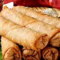 Anda Chicken Roll · Paratha layer with beaten egg filled with chicken tikka boti. Served with chutney and house ...