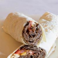 Lamb Boti Roll · Lamb pieces marinated in yogurt, traditional spices grilled, and wrapped in paratha. Served ...