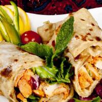 Anda Shish Kabab Roll · Paratha layered with beaten egg filled with classic shish kabab. Served with chutney and hou...