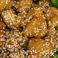 Sesame Chicken · Tender marinated chicken deep-fried & cooked in tangy sesame sauce.